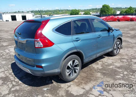 2016 Honda Cr-V Touring z USA, uszkodzony, nr VIN 5J6RM3H9XGL016595